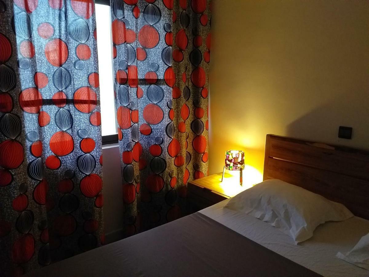 Karls Guesthouse Котону Екстериор снимка